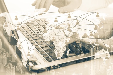 Girl with laptop. The concept of virtual communication on the map.の写真素材