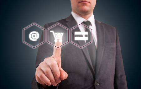 Online shopping business concept selecting shopping cart.の写真素材