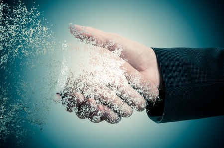 Handshake. The concept is not a reliable partner in business. The effect of the collapse.の写真素材