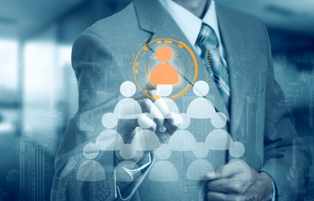 Hand carrying businessman icon network - HR,HRM,MLM, teamwork and leadership concept.の写真素材
