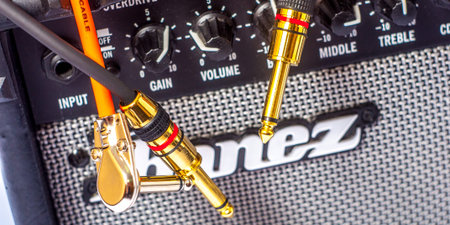 Close-up of guitar amplifier with jack cable.の写真素材