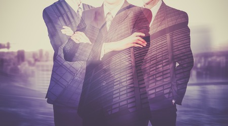 Three businessmen in suits. Business concept leader. Man power. Double exposure.の写真素材