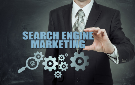 Search engine marketing - SEM concept. Businessman or programmer is focused to improve SEM and web trafficの写真素材