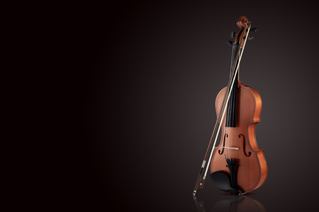 Violin on a black gradient background. Place for textの写真素材