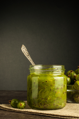 Gooseberry smoothie in a jar on a white table.の写真素材