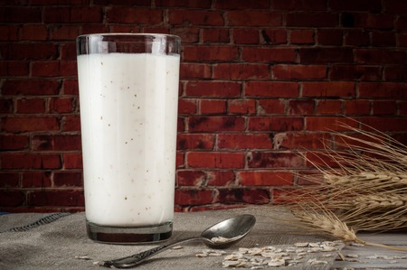 Fresh dairy products and wheat on rustic wooden background. Organic farming dairy concept.の写真素材