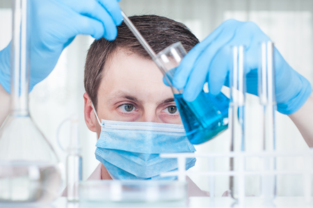 Laboratory scientist working at lab with test tubesの写真素材