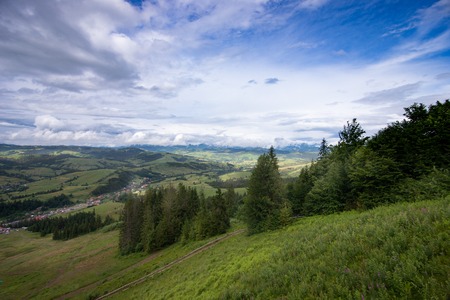 Mountain range clouds panoramic landscape.の写真素材