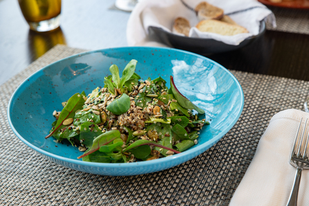 Fresh vegetable salad on wooden background.の写真素材