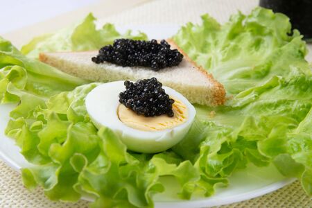 Sandwiches with black caviarの写真素材