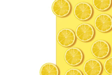 A slices of fresh juicy yellow lemons. Texture backgroundの写真素材