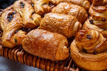 Freshly baked cinnamon buns. Sweet Homemade Pastry baking. Close-upの写真素材