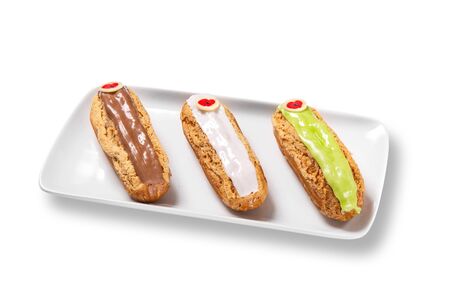 Group of french dessert Eclair on white background.の写真素材