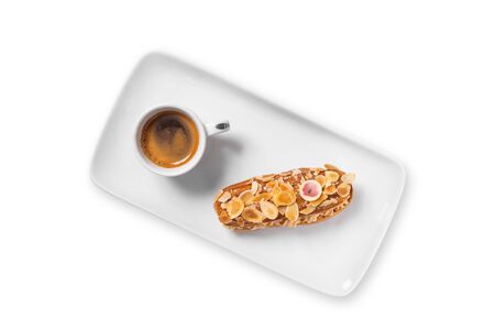 french dessert eclair with coffee on white background.の写真素材