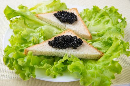 Sandwiches with black caviar. healthy foodの写真素材