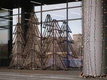street decor in the form of Christmas trees made of wire and garlands. high quality photoの写真素材