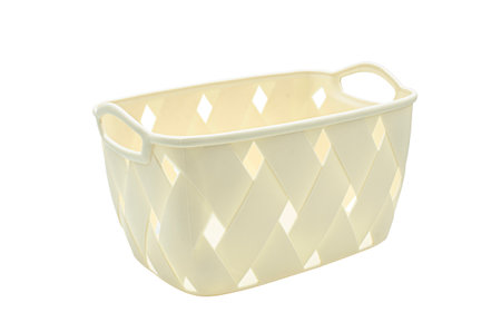Empty beige storage basket on isolated background.の写真素材