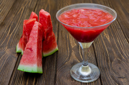 Watermelon smoothies or juice topping with fresh watermelon for summer drinks concept.の写真素材