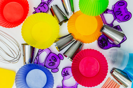 We prepare homemade cookies using multi-colored molds and attachments for stainless steel pastry bags.の写真素材
