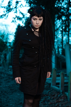 Gothic girl on cemetery の写真素材