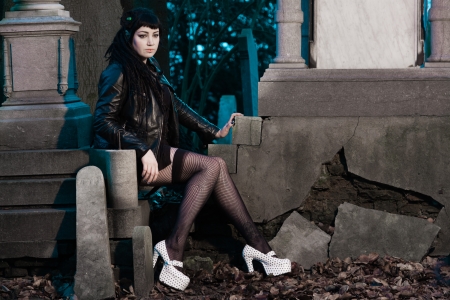 Gothic girl on cemetery の写真素材