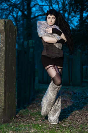 Gothic girl on cemetery の写真素材