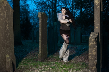 Gothic girl on cemetery の写真素材