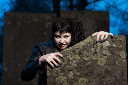 Gothic girl on cemetery の写真素材