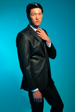 Handsome asian man in suit. Summer fashion. Studio shot.の写真素材