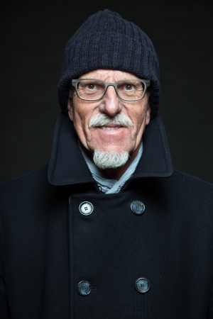 Good looking senior man winter fashion. Studio shot.の写真素材