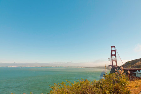 Golden Gate Bridge with clouds and blue sky. San Francisco. USA.