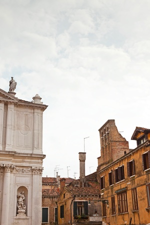 Old houses and architecture with cloudy sky in Venice. Italy.の写真素材