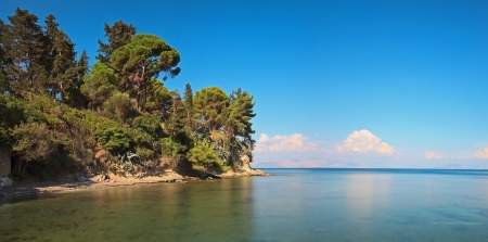 Panoramic long exposure shot of blue sea with blue cloudy sky on Corfu island  Greece の写真素材