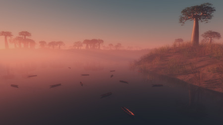 Small boats moored on a lake at sunrise with a colorful pink low-lying mist clinging to the water and a grove of tropical treesの写真素材