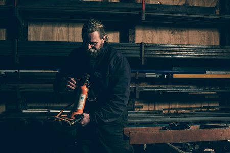 Welder preparing soldering machine