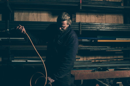 Welder preparing soldering machine