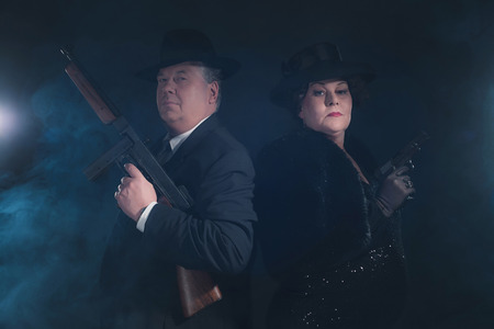 Vintage 1940s gangster couple. Classic portrait.の写真素材