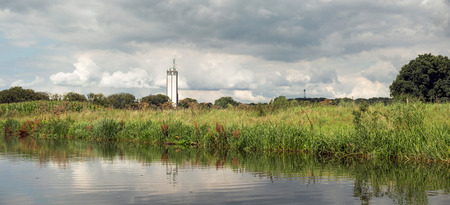 Old dutch factory seen from river the Berkel. Achterhoek. Gelderland. The Netherlands.の写真素材
