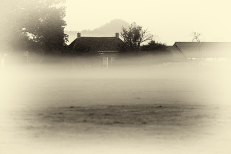 Antique plate photography of old dutch farm in morning mist. Geesteren. Gelderland. The Netherlands.の写真素材