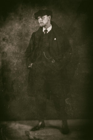 Retro 1920s english gangster. Peaky blinders style.