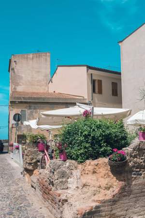 Outdoor terrace of wine bar in old town of Alghero. Sardinia. Italy.の写真素材