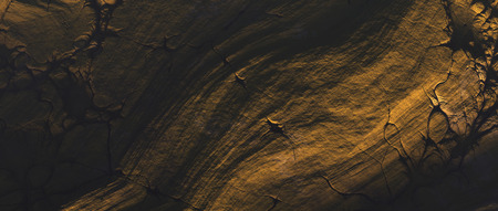 Bare cracked green landscape. High angle view.の写真素材