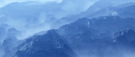 Rough rocks and mountains in mist. High angle view.の写真素材
