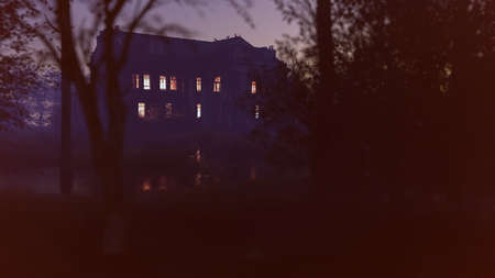 Creepy illuminated abandoned historic country house at dawn. 3D render.の写真素材