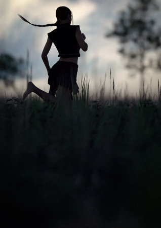 Woman with ponytail in black skirt and shirt runs barefeet through a field with tall grass under a dark cloudy sky. 3D render.の写真素材