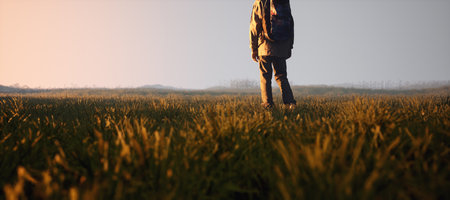 Boy with backpack in pasture in countryside during sunset. 3D rendering.の写真素材
