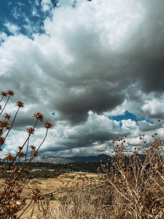 Vast mountainous landscape with cloudy sky. Andalusia, Spain.の写真素材