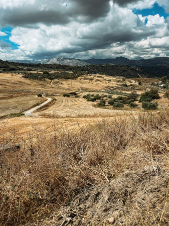 Vast mountainous landscape with cloudy sky. Andalusia, Spain.の写真素材