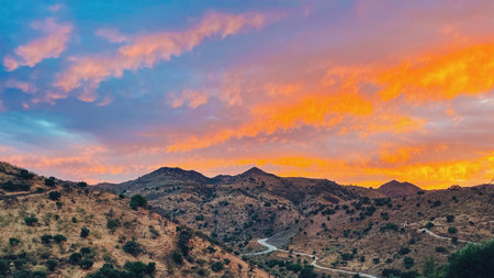 Rolling landscape with hills during sunset in countryside of Malaga, Andalucia, Spain.の写真素材