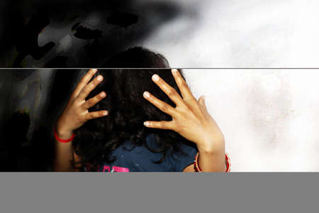a girl hair on her face looking frightful
